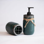 Green mason jars, one with pump dispenser on a white background.