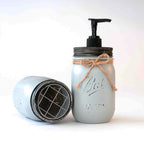 Mason jar soap dispenser with pump and lid on a white background.
