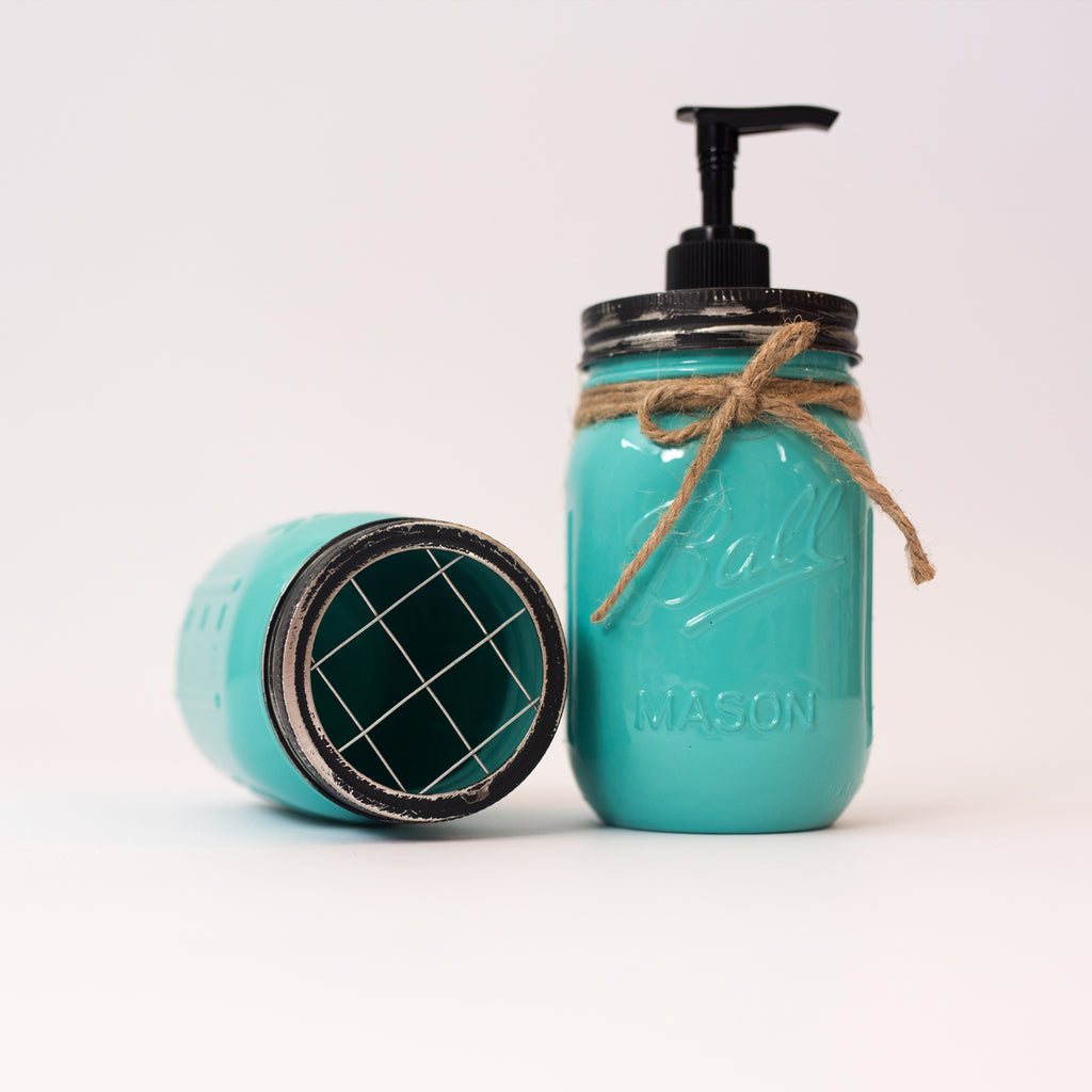 Turquoise mason jar soap dispenser with pump and twine on a white background.